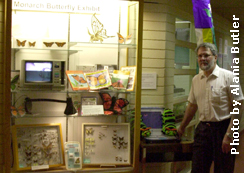Robert Holmberg with the Monarch display. Photo by Alania Butler.