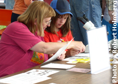 An evidence assessment with Dr. Carter. Photo by Robert Holmberg.